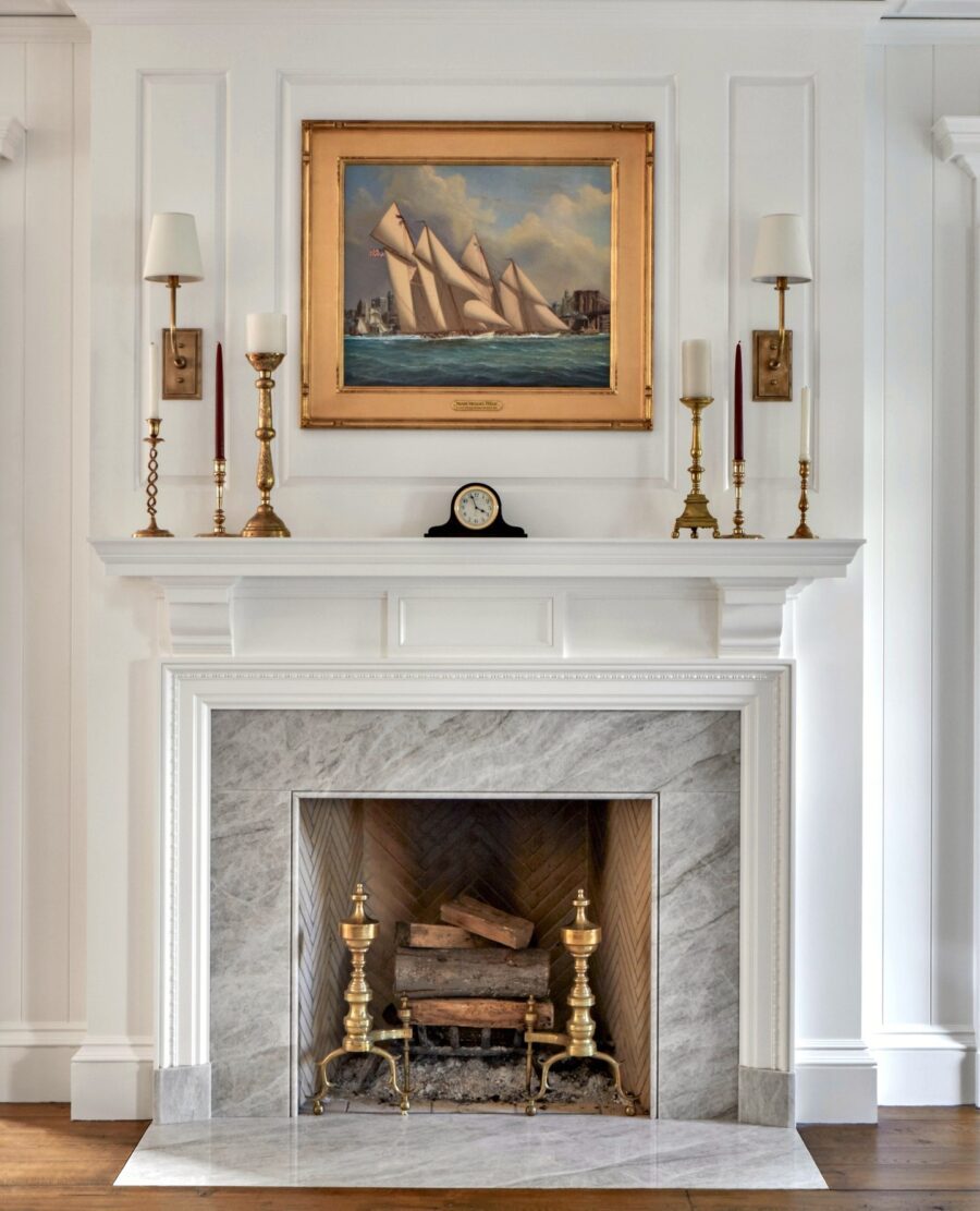 Sophisticated fireplace design with nautical art