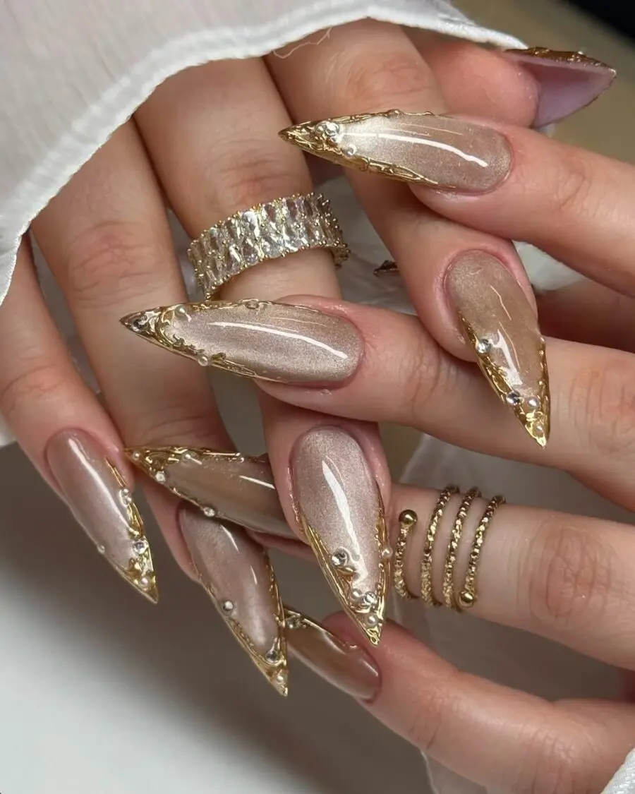 Chic gold-tipped nails for a glam look