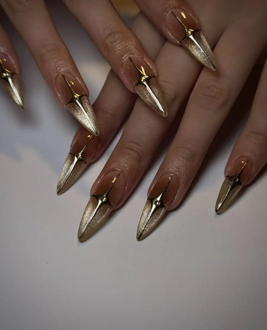 Sophisticated gold stiletto nail art design