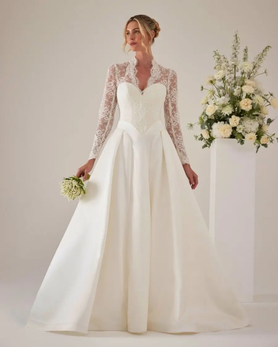 Stunning lace sleeves add elegance to bridal look