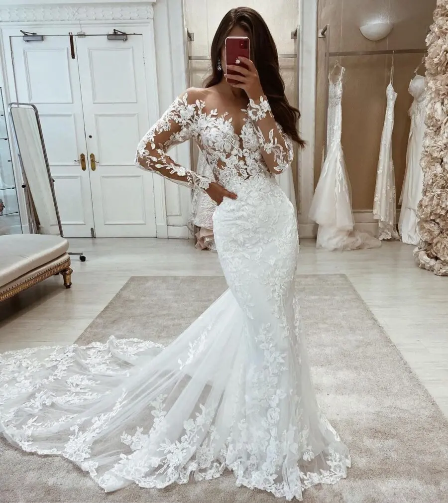 Stunning long-sleeve lace wedding gown.