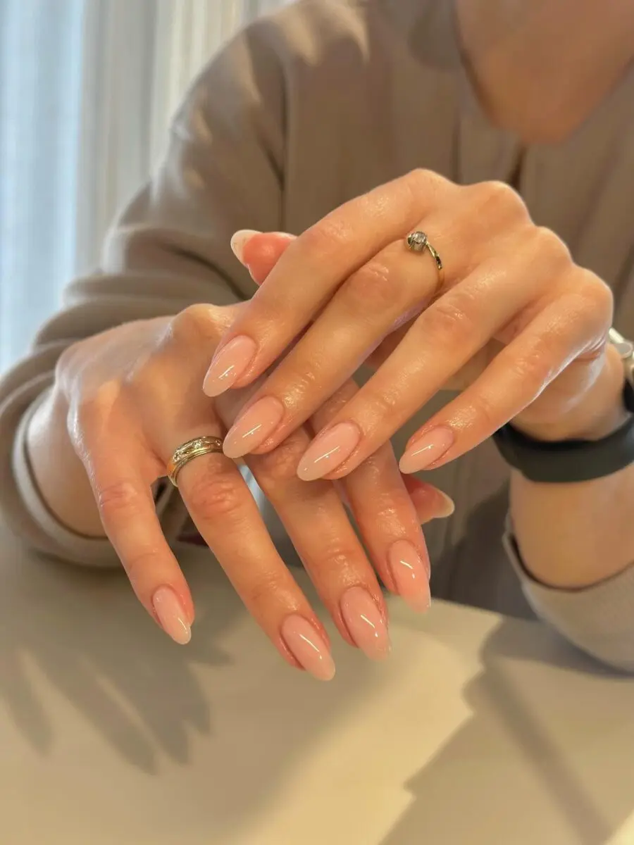 Elegant light pink clean girl nails on display