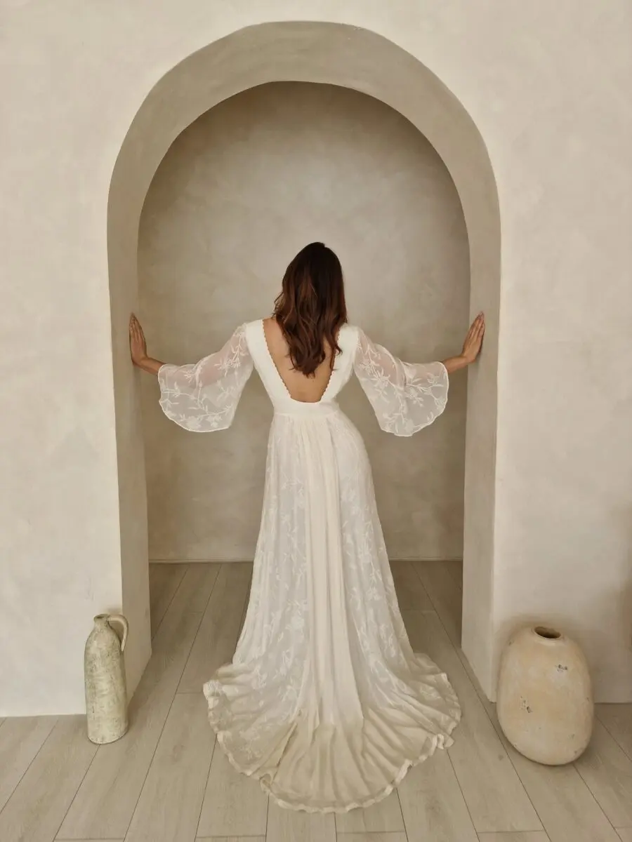 Chic and ethereal wedding dress showcases elegance.