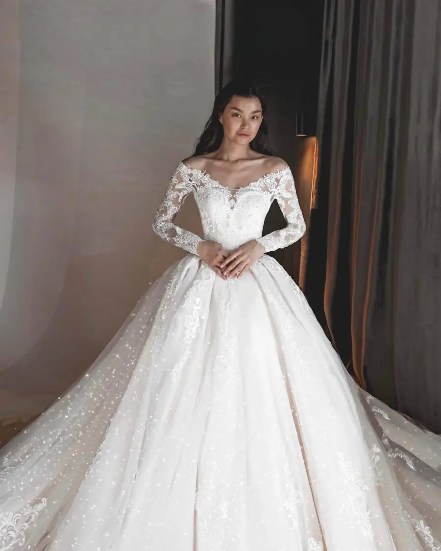 Elegant gown with delicate lace and sleeves