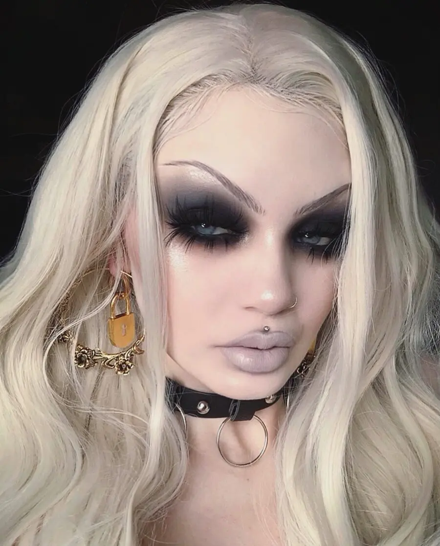 Striking black smoky eyes with pale lips