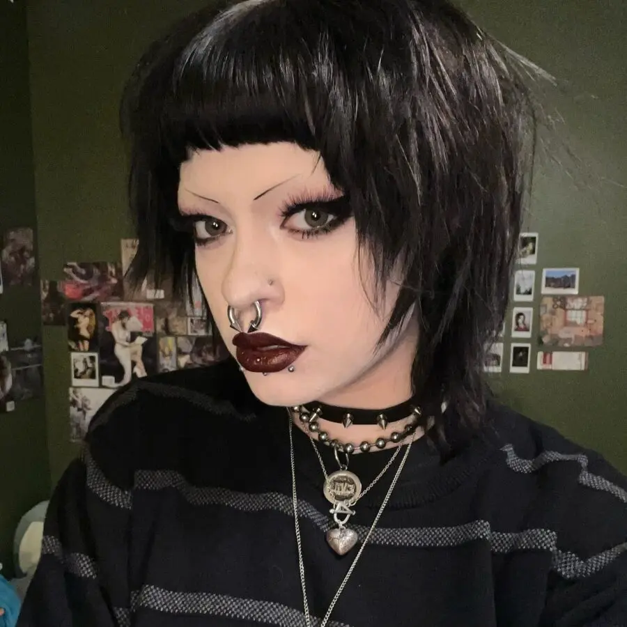 Edgy emo look complete with bold lips