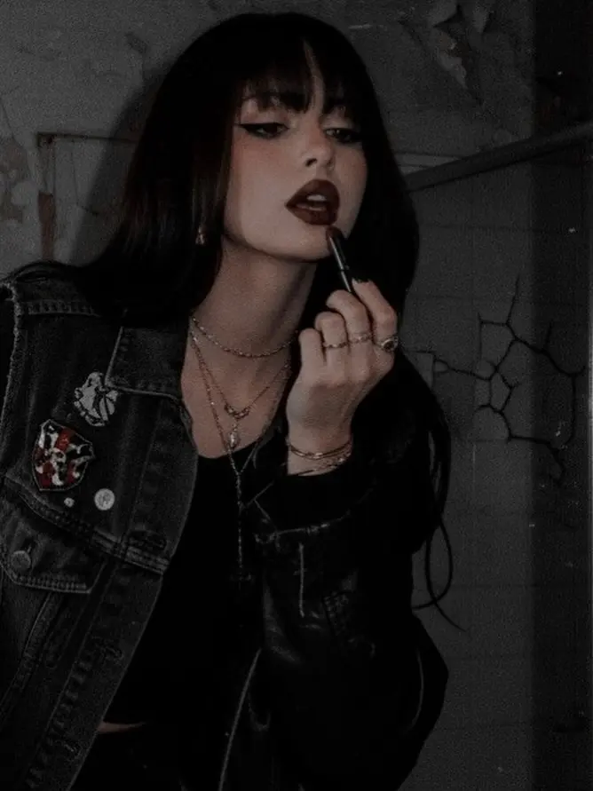 Bold dark lipstick with edgy style vibes