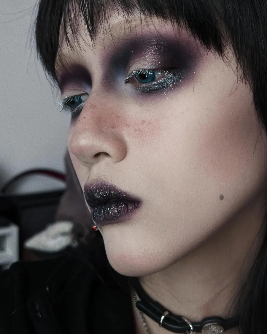Stylish dark smoky eye with glitter accents