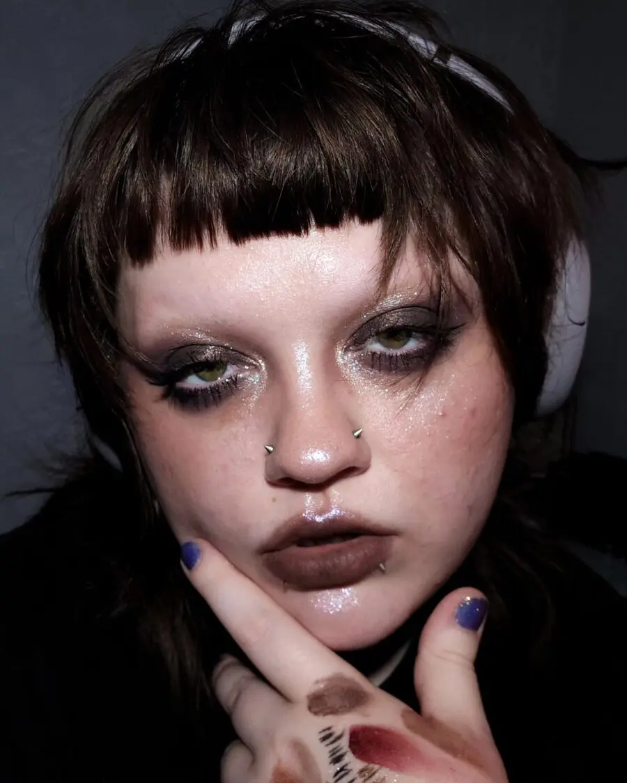 Glittery smoky eyes with bold lips