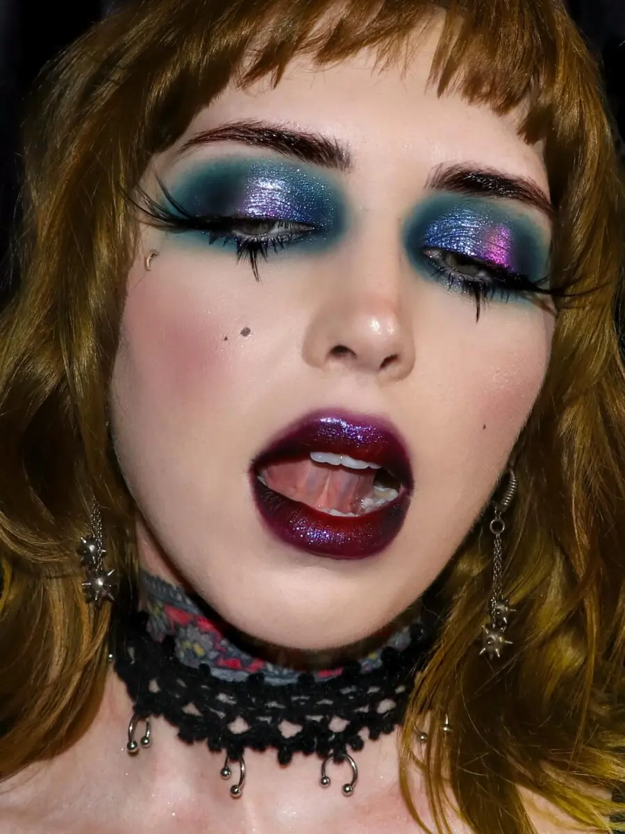 Bold glittery eyes with dark lip vibes