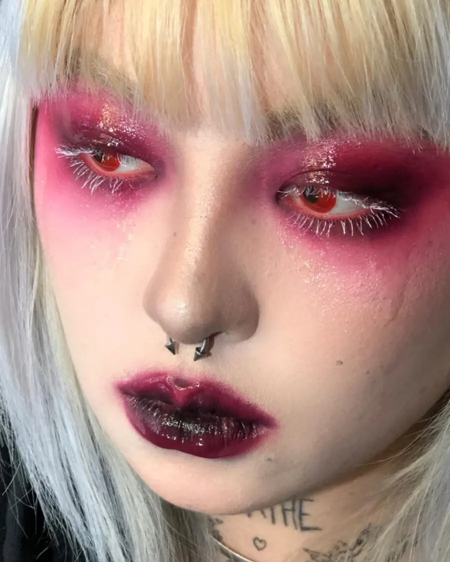 Vibrant pink and gothic-inspired makeup look