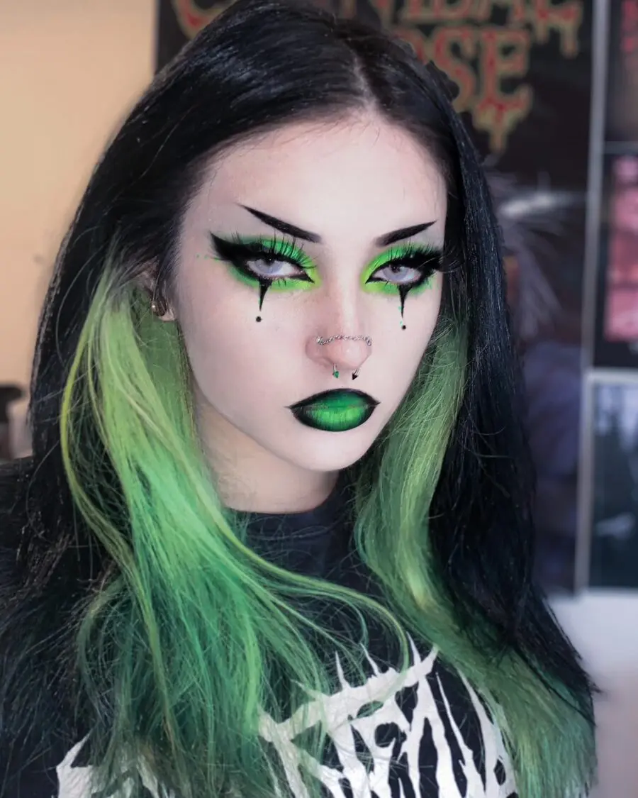 Edgy green and black emo makeup vibes