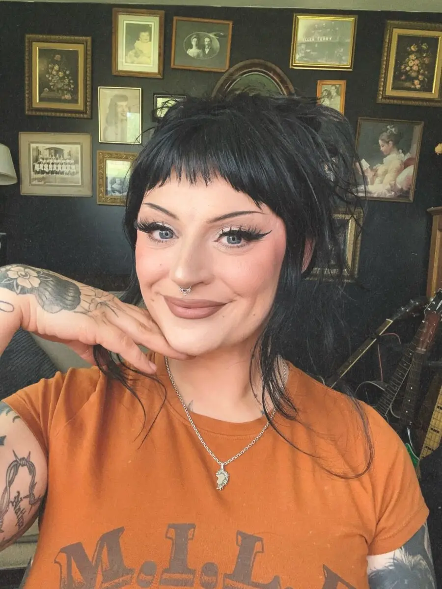 Bold eyeliner and soft lip for emo vibes