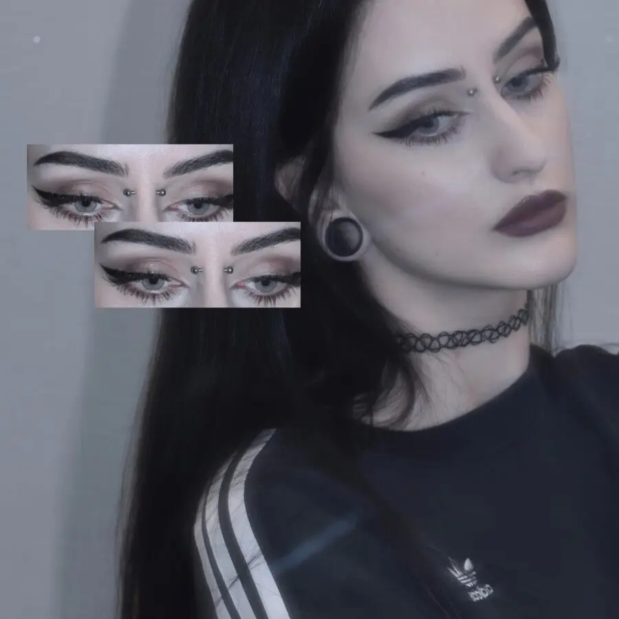 Dark and bold emo makeup look with flair