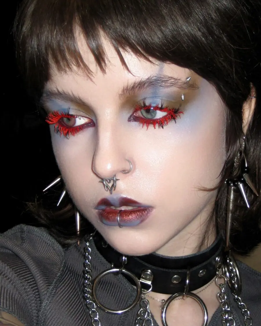Bold emo makeup with striking red details