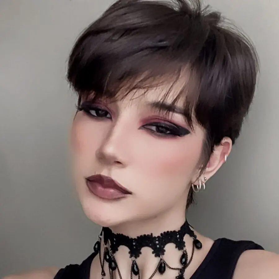 Dramatic emo makeup with bold dark tones