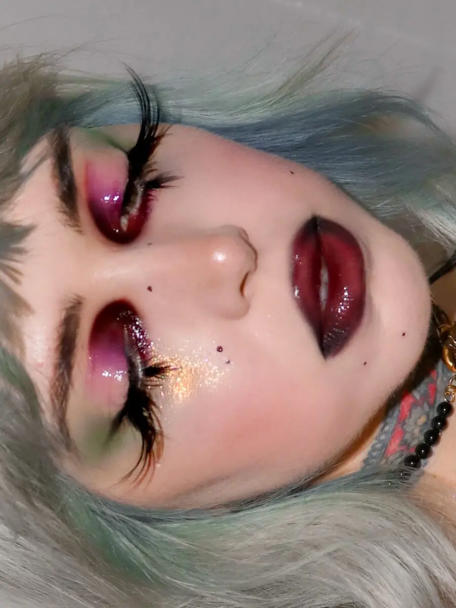 Bold and artistic emo-inspired makeup look