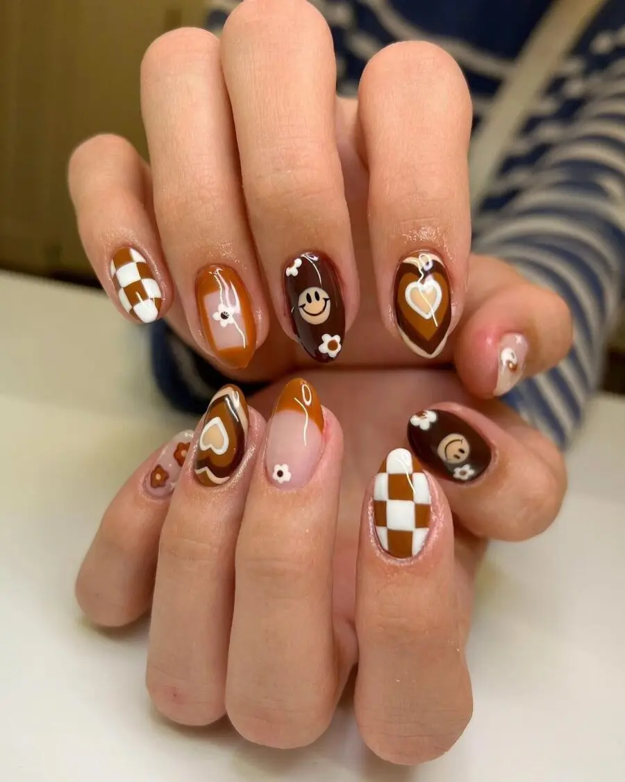 Charming fall-themed nails with playful designs