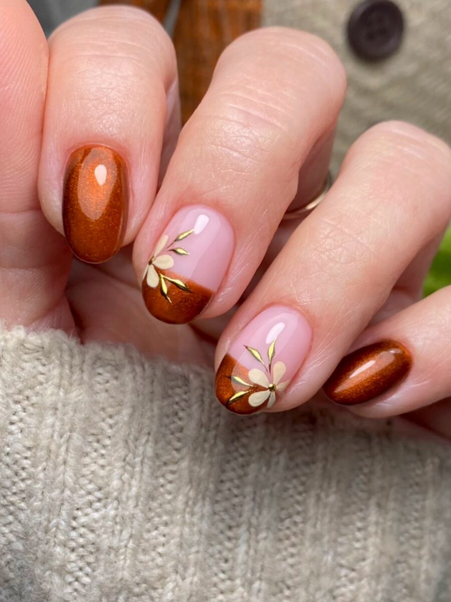 Gorgeous autumn nail design with floral accents