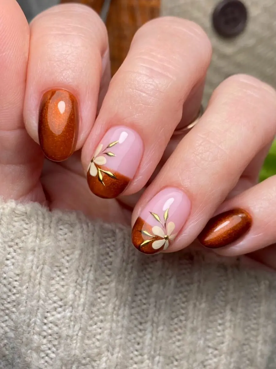 Gorgeous autumn nail design with floral accents