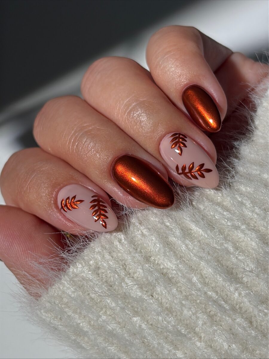 Elegant autumn-inspired nail design with leaves