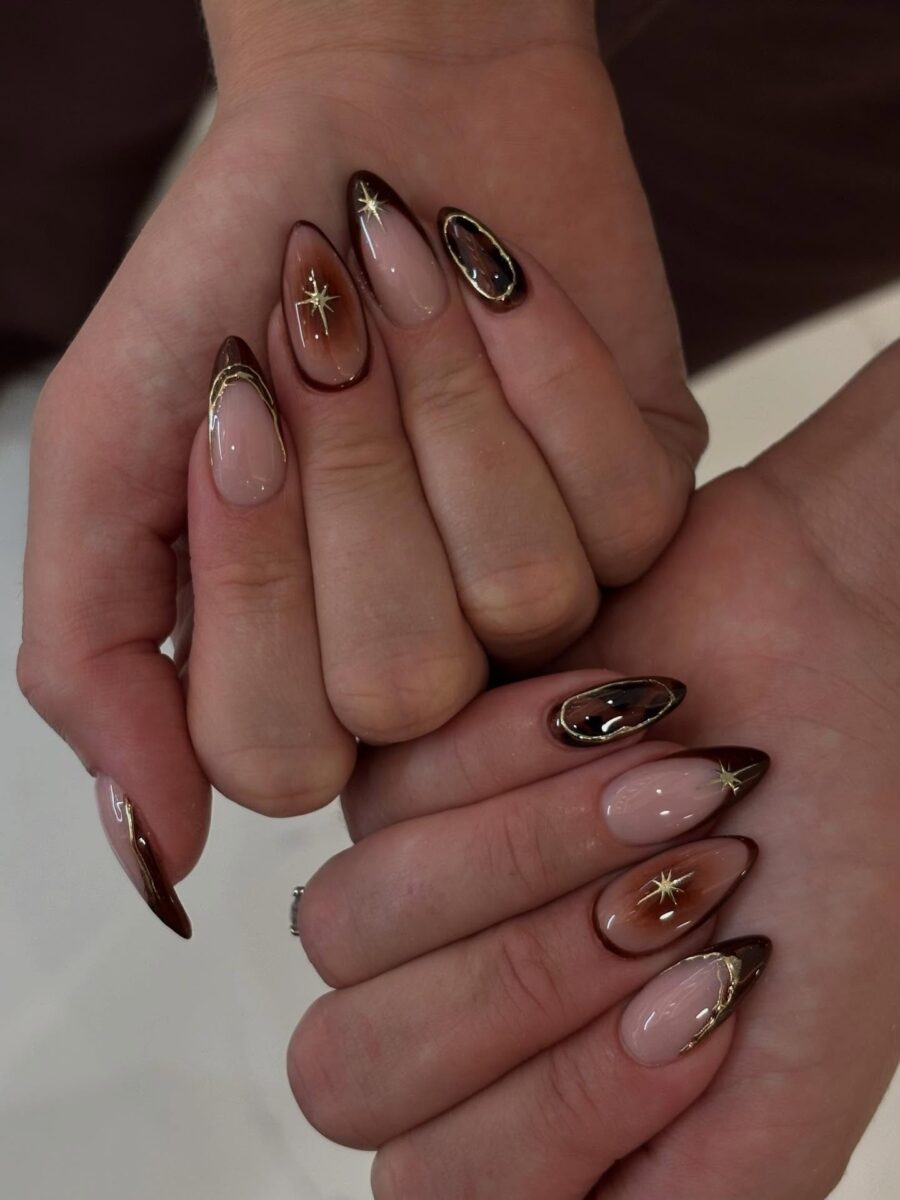 Elegant fall nails with starry accents