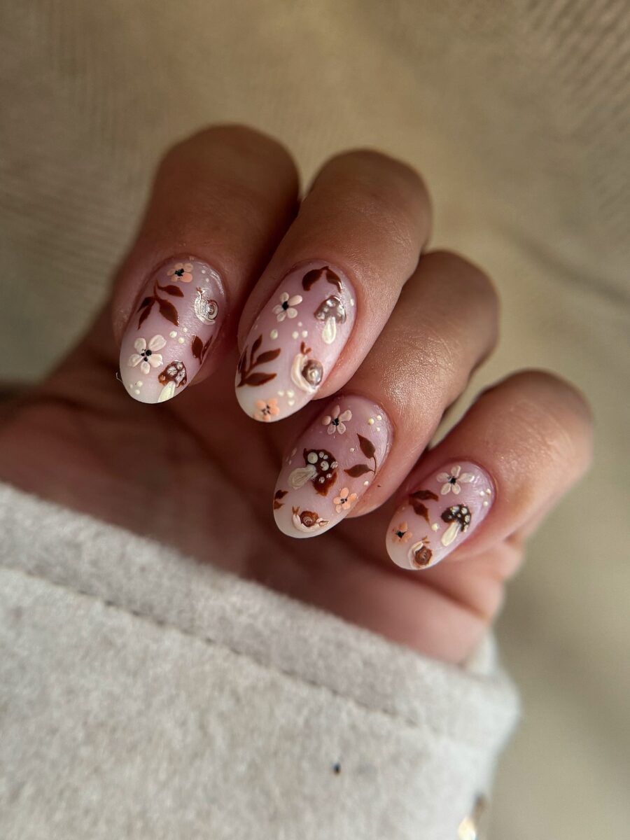 Charming floral fall nail design with soft hues