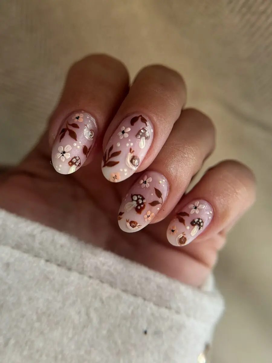 Charming floral fall nail design with soft hues