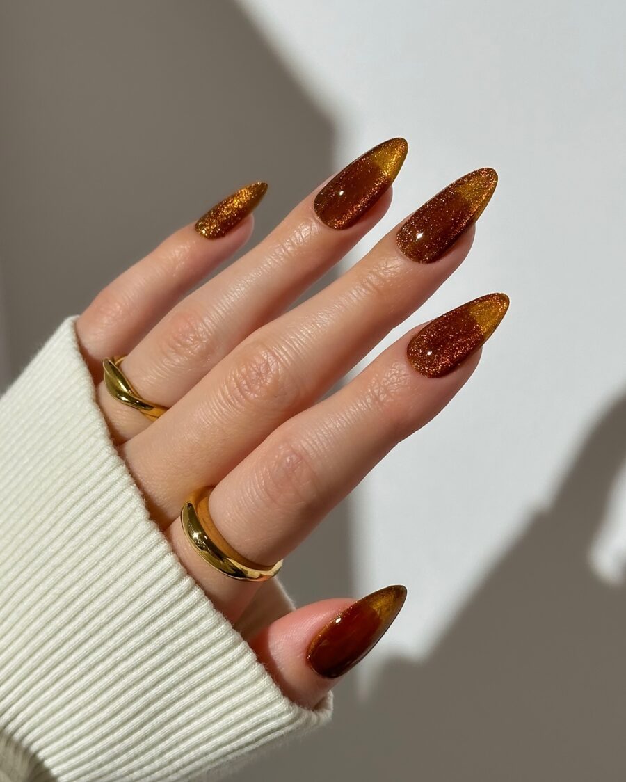 Gorgeous fall-inspired glitter nails in warm hues
