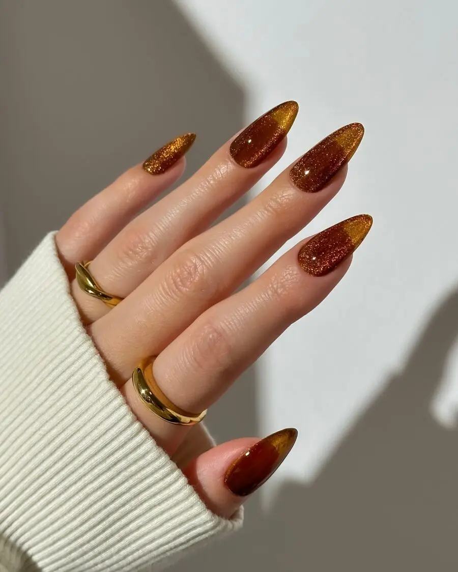 Gorgeous fall-inspired glitter nails in warm hues