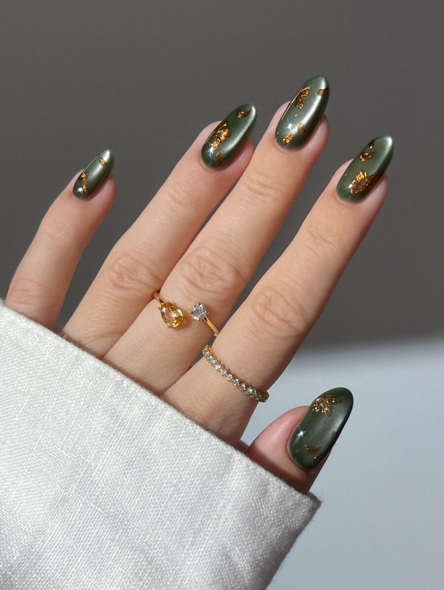 Elegant Green Nails with Gold Accents