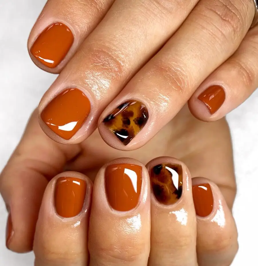 Stylish autumn-inspired tortoise shell nails