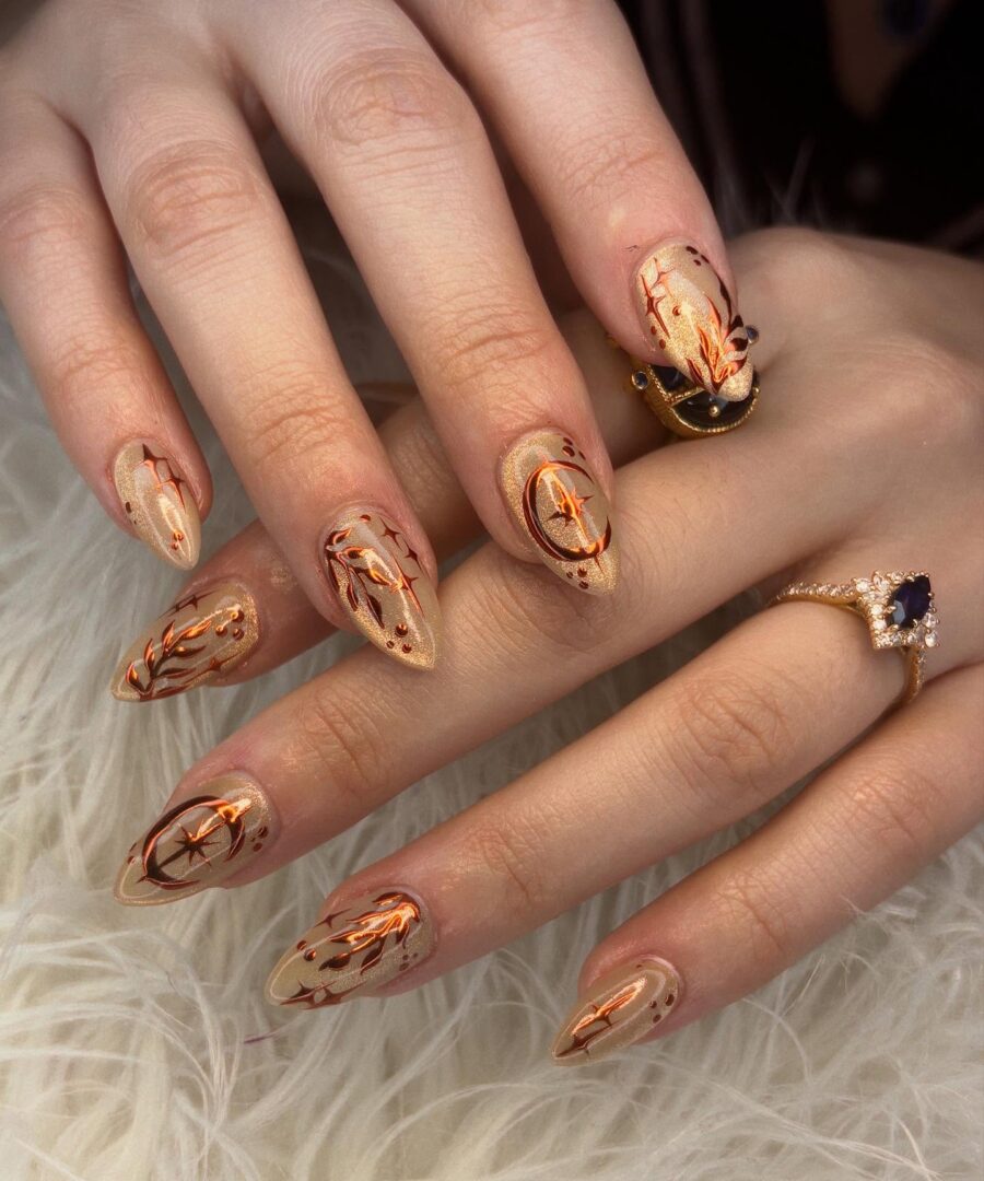 Vibrant fall nails with intricate designs