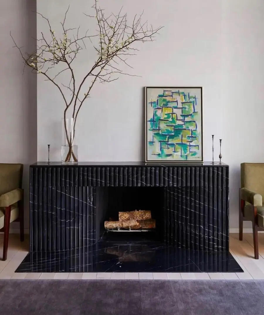 Sleek marble fireplace exudes modern elegance