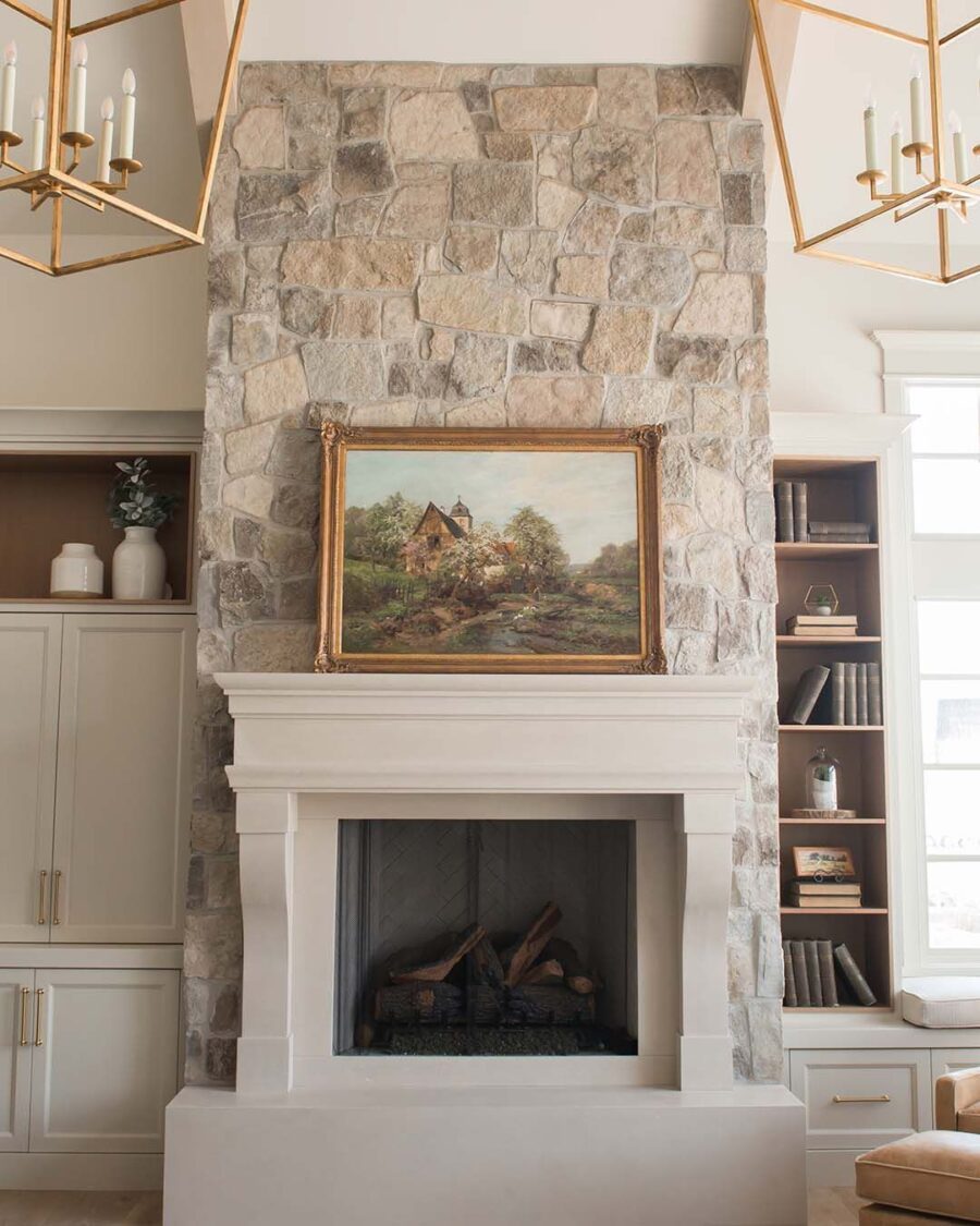 Elegant stone fireplace with artistic accent