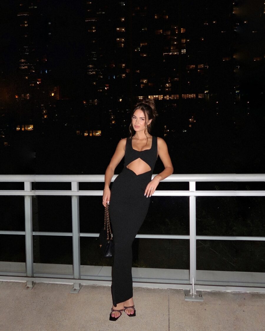 Sleek black cutout dress for nightlife styling