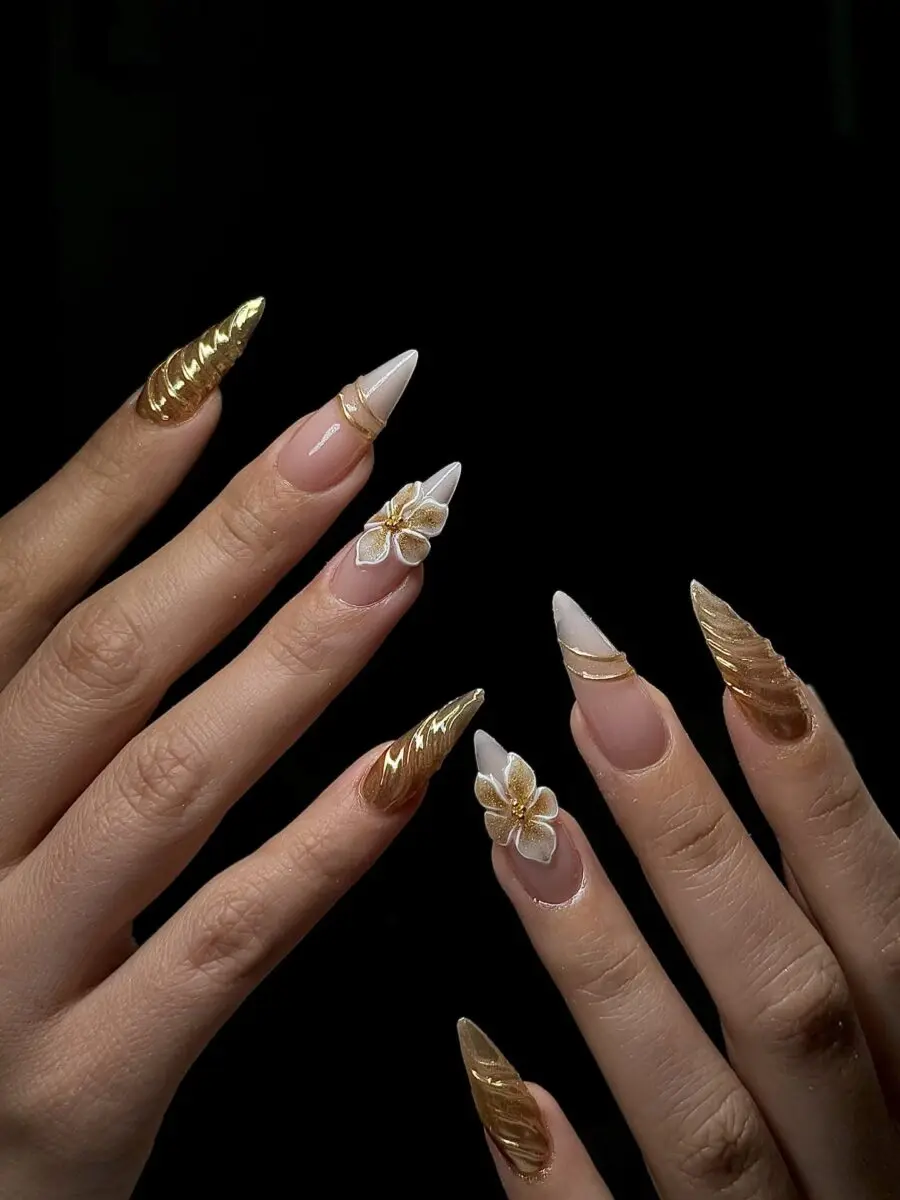 Gorgeous gold nails with floral elegance