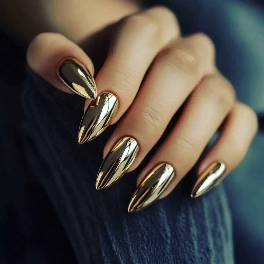 Gleaming gold stiletto nails steal the show
