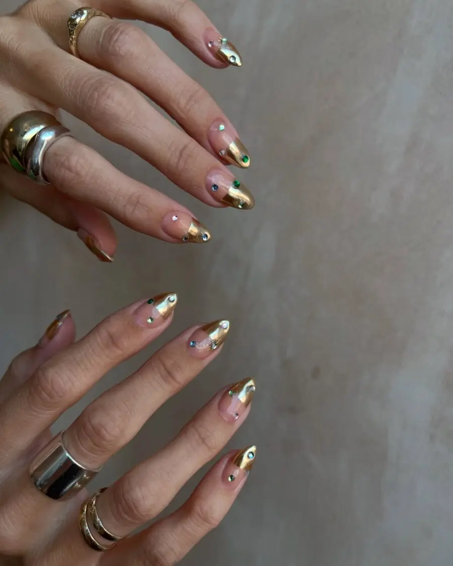 Chic gold nail art with playful accents
