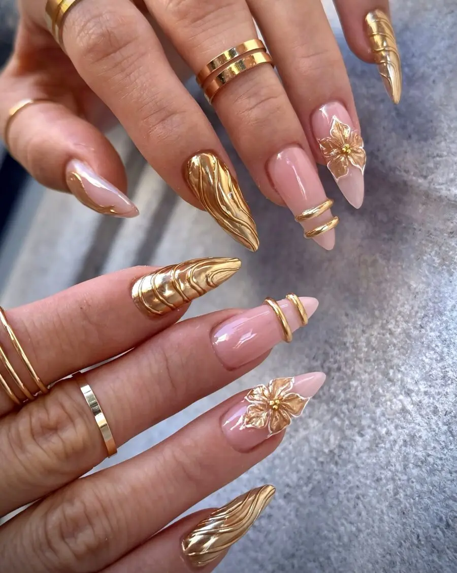Chic gold nails with intricate textured designs