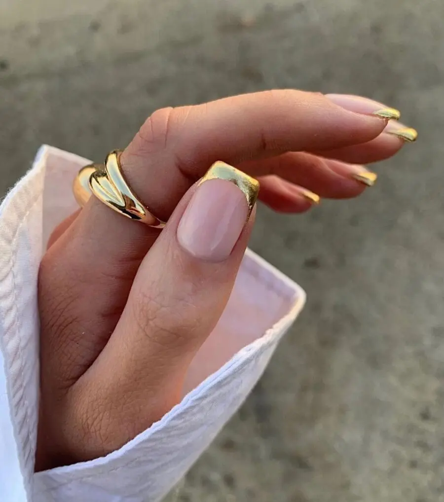 Chic gold-tipped nail design for elegance
