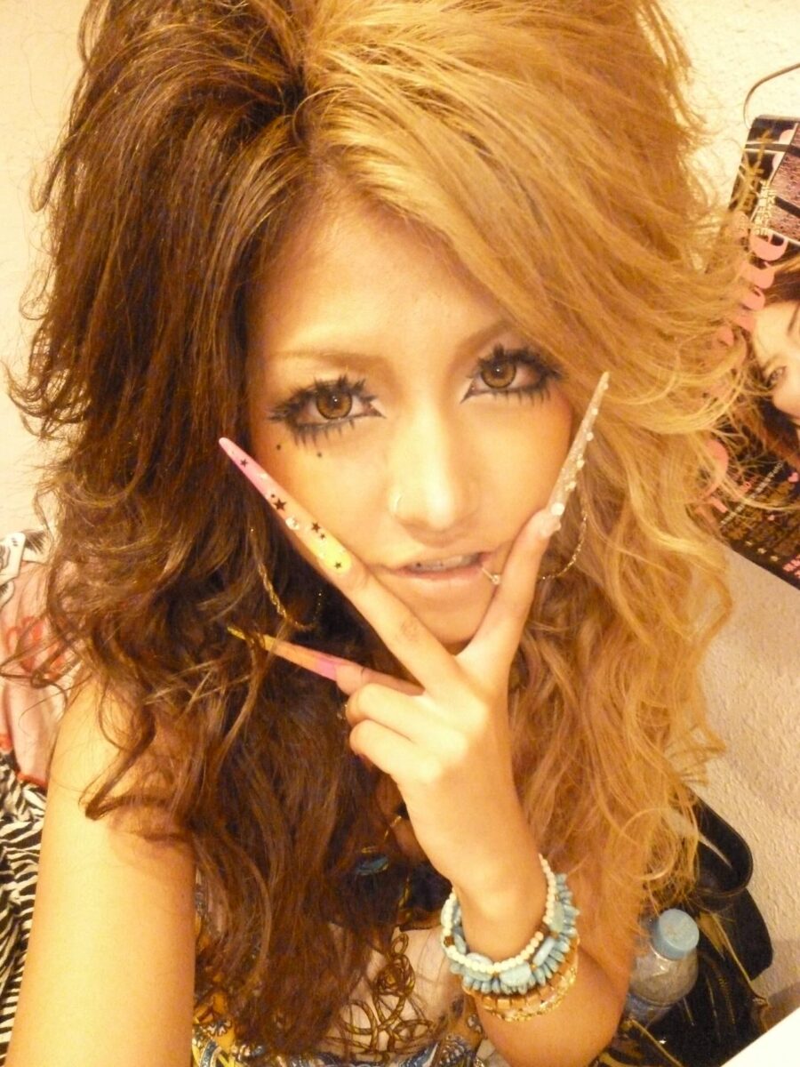 Striking dual-toned hair and bold nails