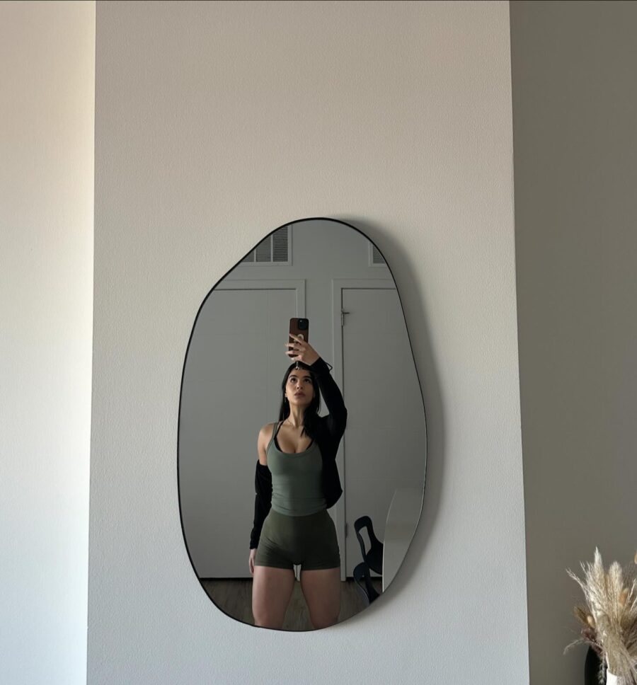 Chic green gym outfit reflecting confidence