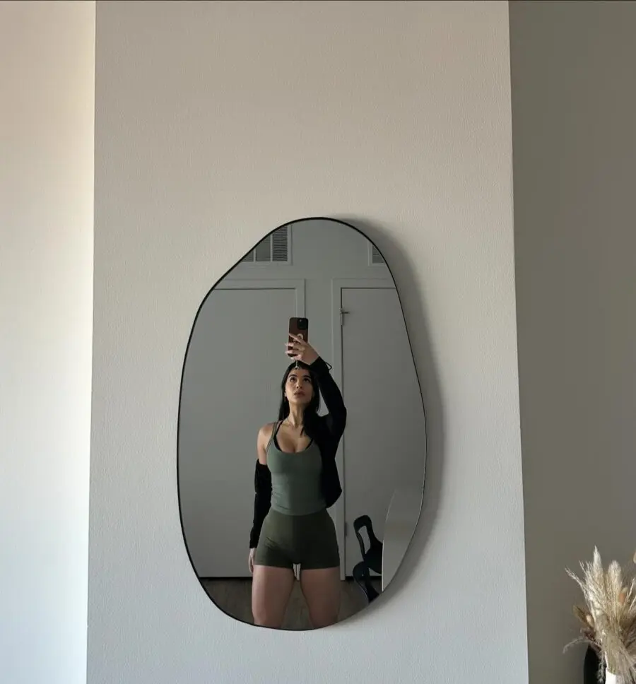Chic green gym outfit reflecting confidence