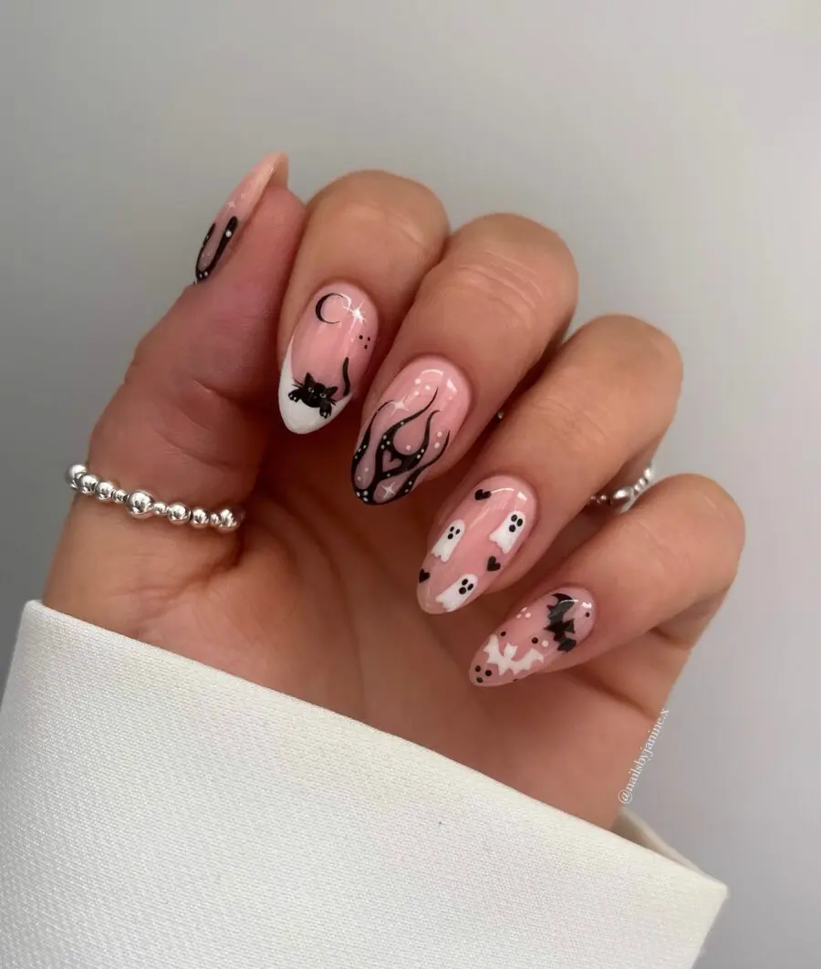 Chic Halloween Nail Art with Cats and Spiders