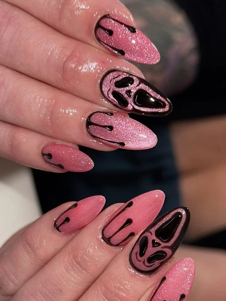 Glam Pink and Black Halloween Nail Design