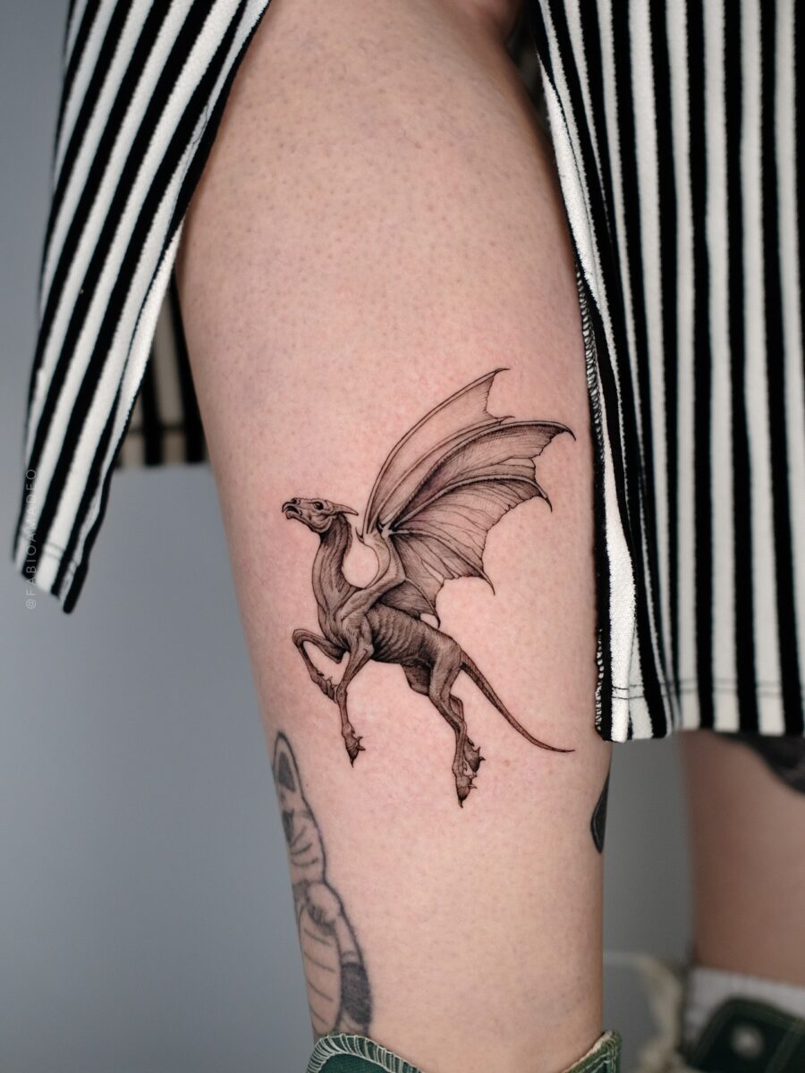 Intricate depiction of a magical creature tattoo