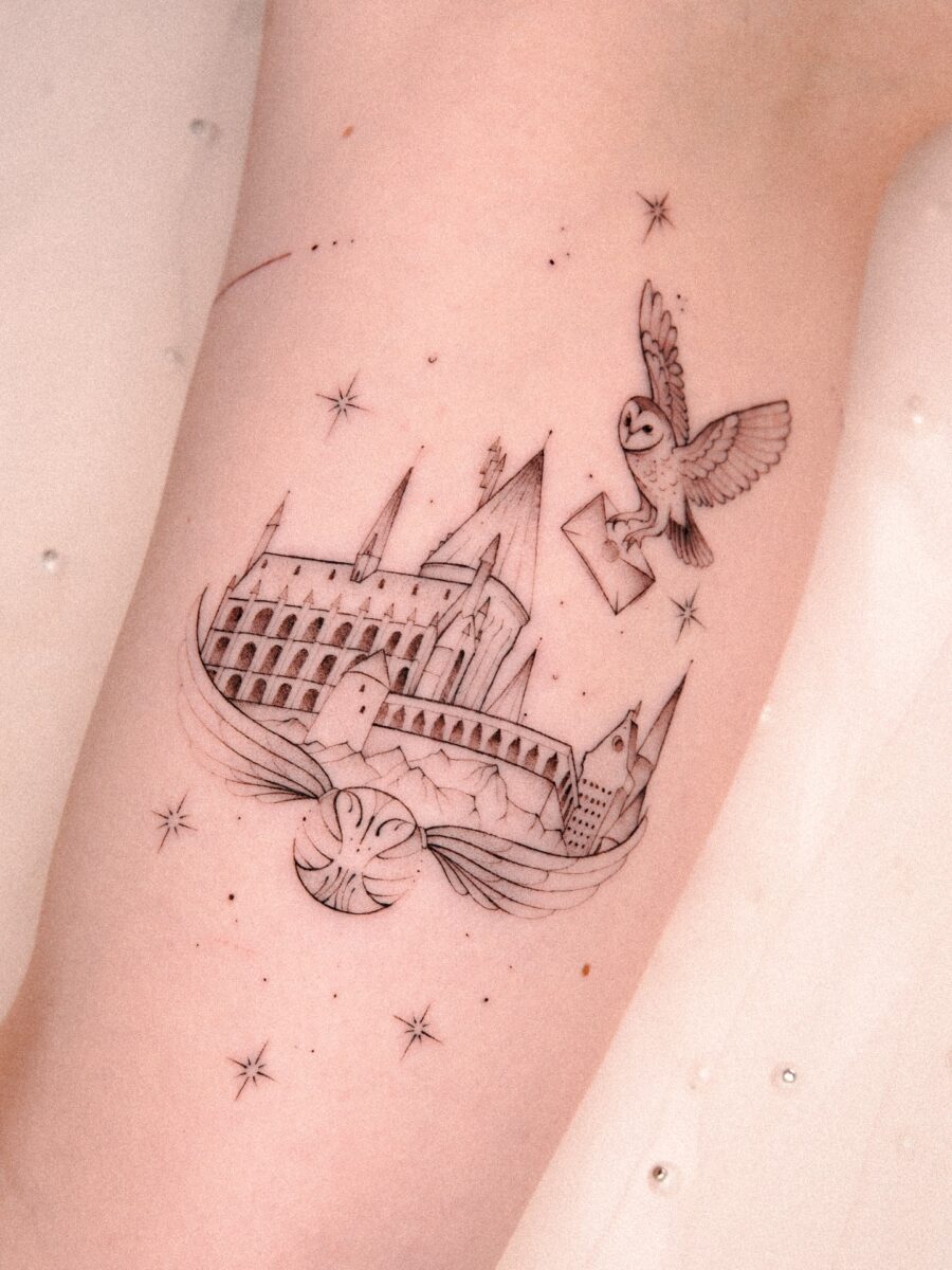 Intricate Hogwarts Tattoo with Owl and Stars