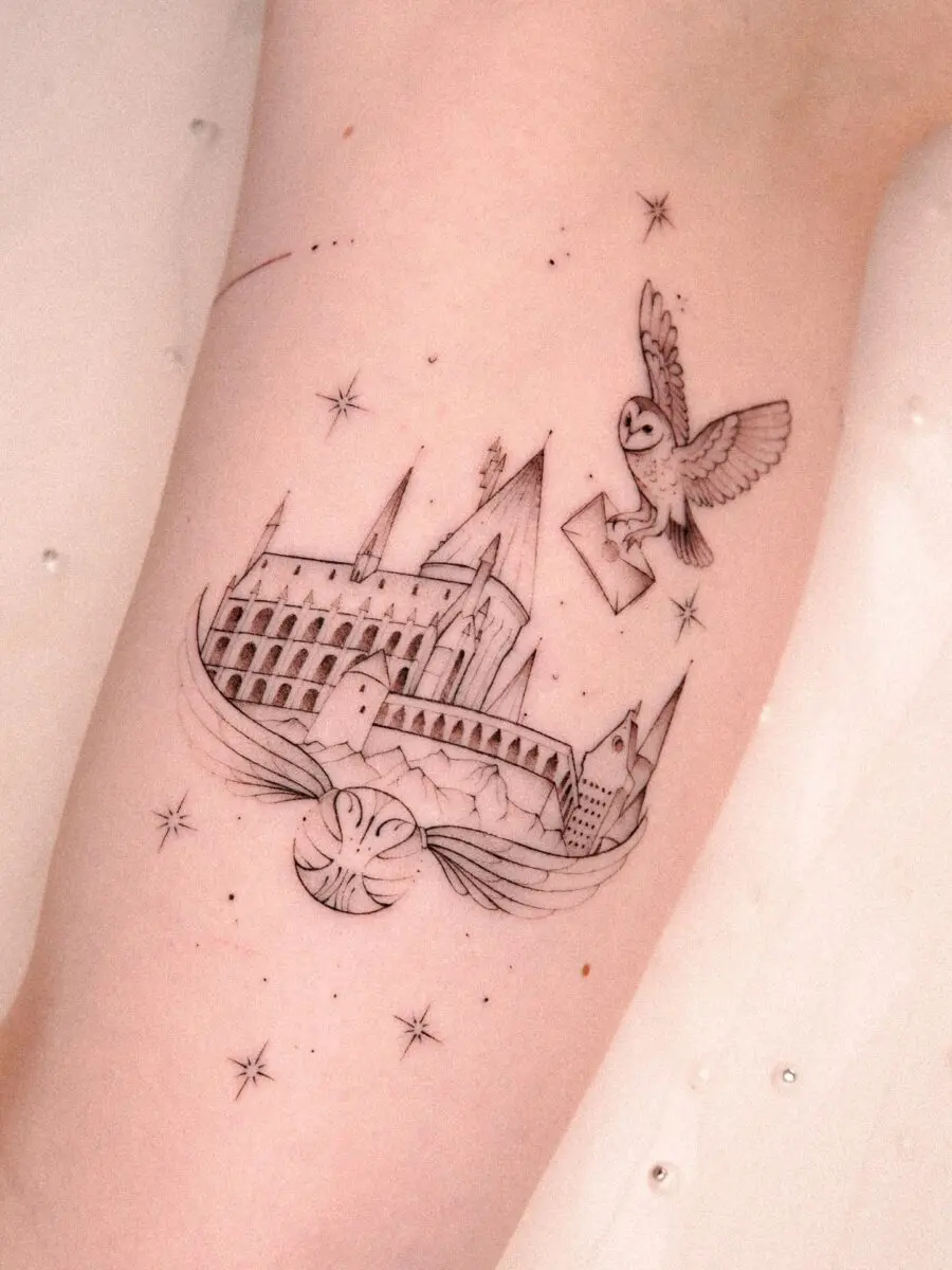 Intricate Hogwarts Tattoo with Owl and Stars