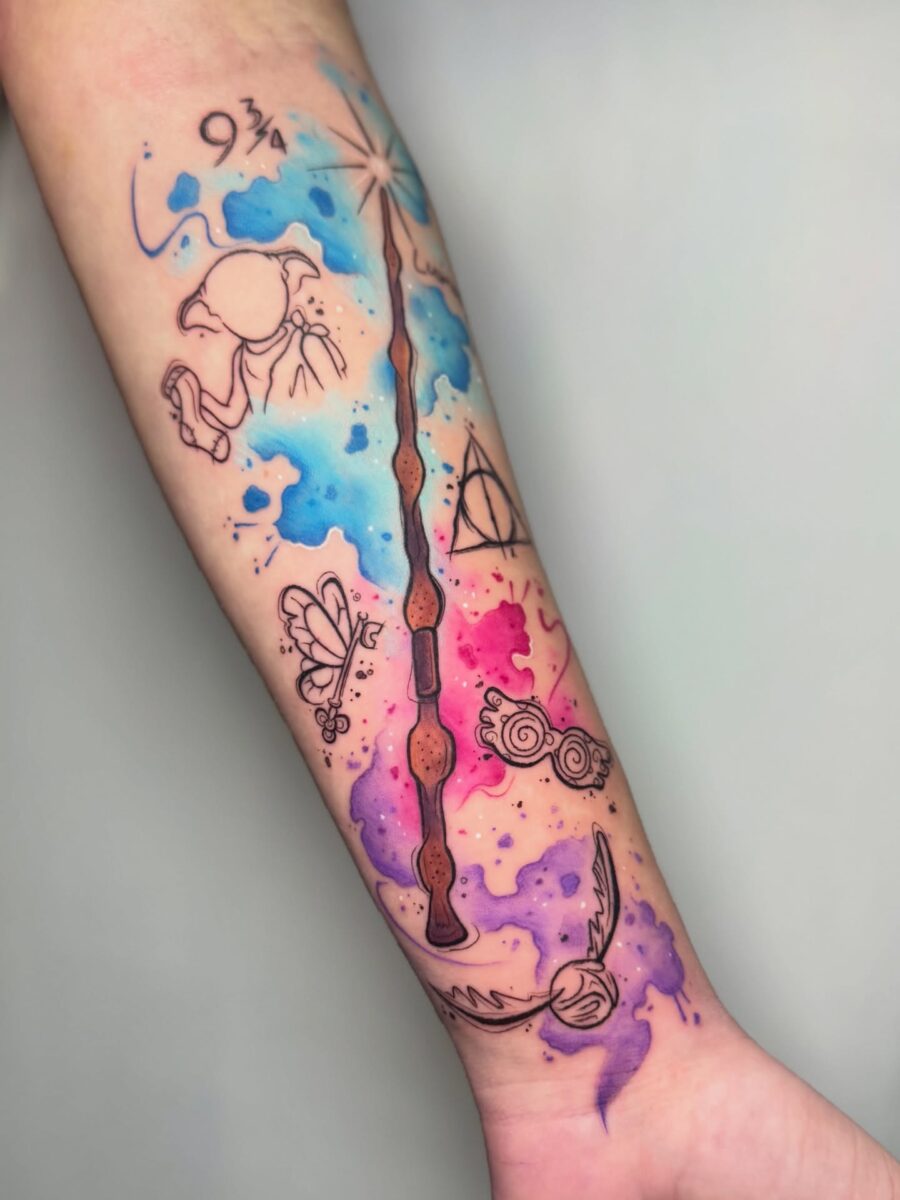 Magical wand tattoo with vibrant colors